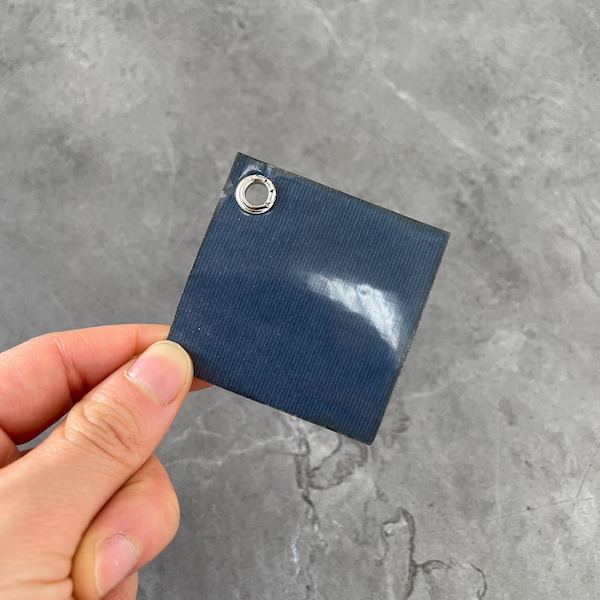 Adhesive backing placed on the back of our custom embroidered patches