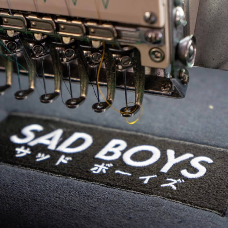 a solid rectangle of embroidered threads